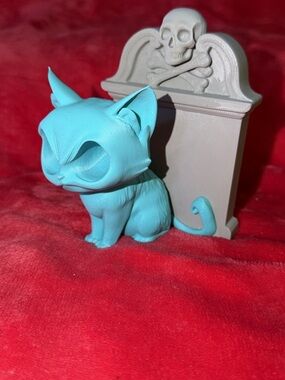 Sitting Cat Figurine with Tombstone Accent